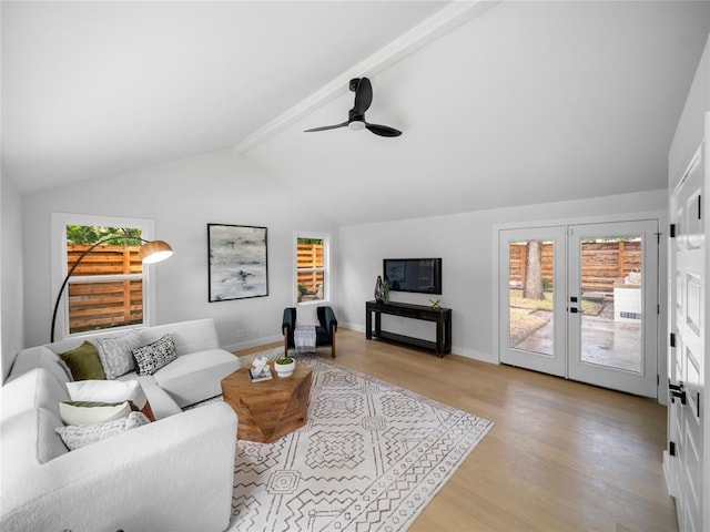 2004 N Cuernavaca Dr, Austin, TX 78733 - living area featuring wood finished floors, a ceiling fan, baseboards, and french doors