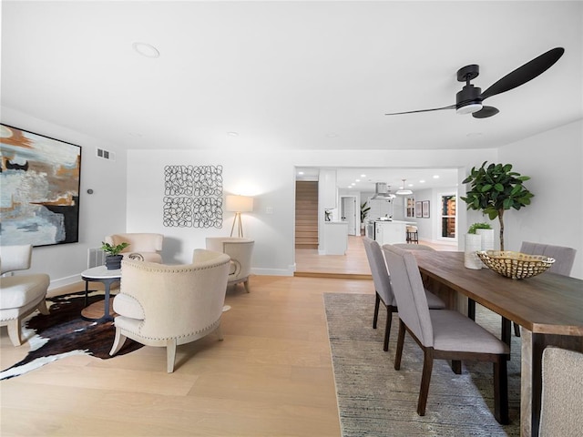 2004 N Cuernavaca Dr, Austin, TX 78733 - living room with light wood-type flooring, ceiling fan, baseboards, and recessed lighting