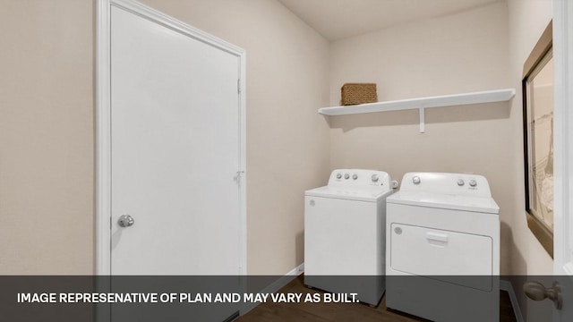 272 Morning Glory Loop, Kyle, TX 78640 - laundry area with washer and clothes dryer, wood finished floors, and baseboards