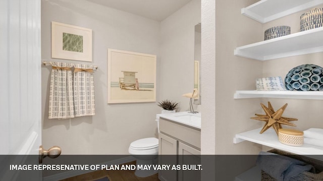 272 Morning Glory Loop, Kyle, TX 78640 - bathroom featuring vanity and toilet
