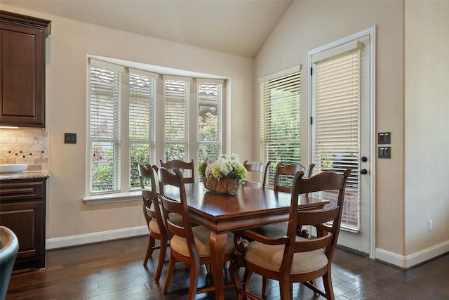 209 Maxwell Way, Austin, TX 78738 - dining room with dark wood finished floors, baseboards, and vaulted ceiling