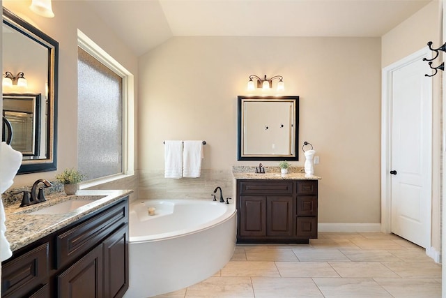 209 Maxwell Way, Austin, TX 78738 - full bath with two vanities, a bath, and lofted ceiling