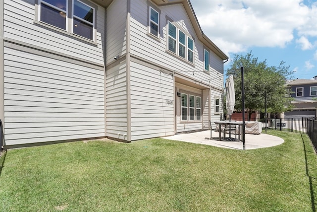 rear view of house featuring a patio
