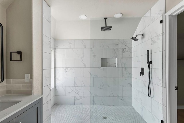7057 Thistle Hill Way, Austin, TX 78754 - full bathroom with a tile shower and vanity