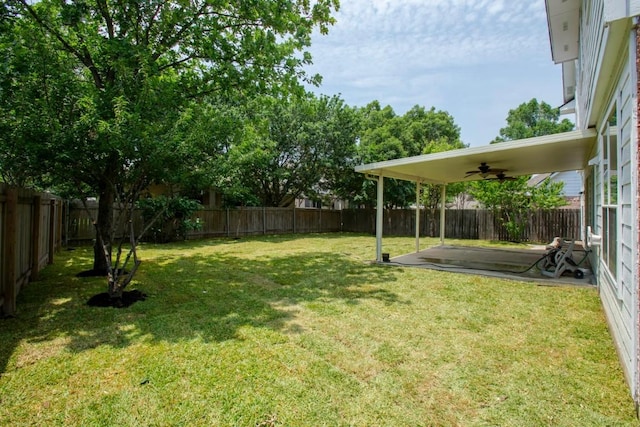 7057 Thistle Hill Way, Austin, TX 78754 - view of yard with a ceiling fan and a patio area