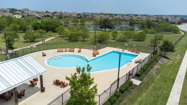 7057 Thistle Hill Way, Austin, TX 78754 - community pool featuring a water view, a residential view, and a patio