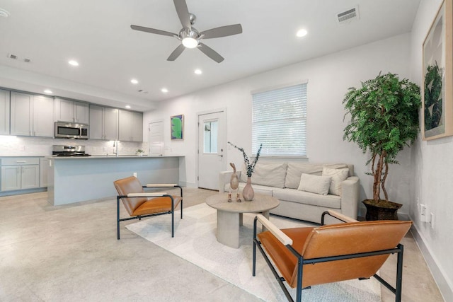 7301 Providence Ave Unit B, Austin, TX 78752 - living area featuring recessed lighting, ceiling fan, and baseboards