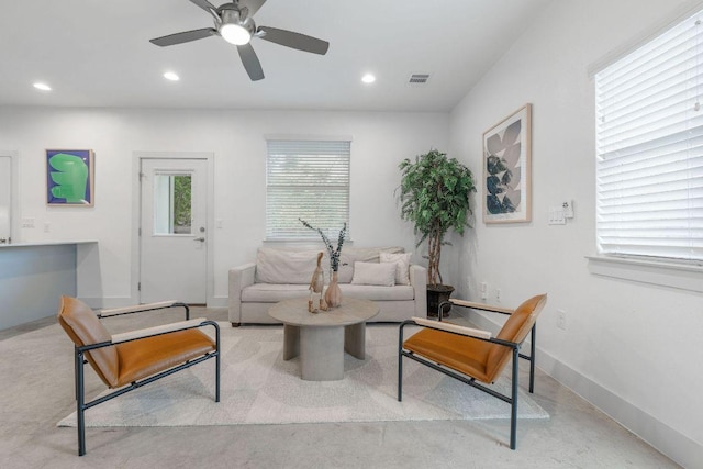 7301 Providence Ave Unit B, Austin, TX 78752 - living area with concrete floors, recessed lighting, and a ceiling fan