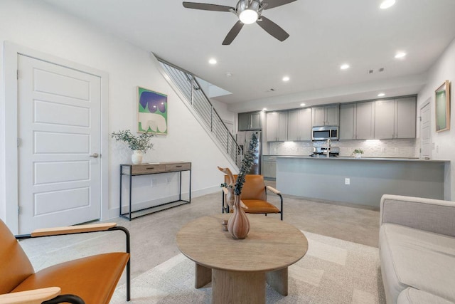 7301 Providence Ave Unit B, Austin, TX 78752 - living area featuring a ceiling fan, recessed lighting, stairway, concrete flooring, and baseboards