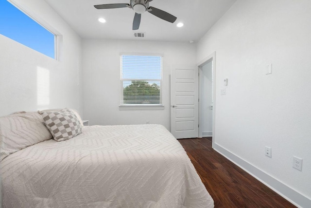 7301 Providence Ave Unit B, Austin, TX 78752 - bedroom featuring dark wood-type flooring, baseboards, ceiling fan, and recessed lighting