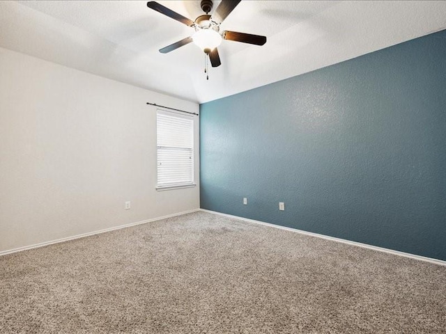 362 Maple Way, New Braunfels, TX 78132 - carpeted empty room with a ceiling fan, baseboards, and a textured wall