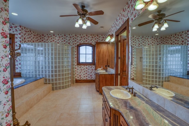 530 Scenic View Dr, Marble Falls, TX 78654 - bathroom featuring a ceiling fan, wallpapered walls, tile patterned flooring, a garden tub, and vanity