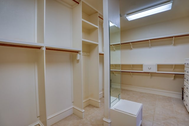 530 Scenic View Dr, Marble Falls, TX 78654 - spacious closet featuring light tile patterned floors