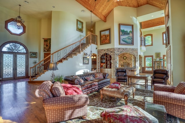 530 Scenic View Dr, Marble Falls, TX 78654 - living area with high vaulted ceiling, stairs, wood finished floors, plenty of natural light, and wooden ceiling