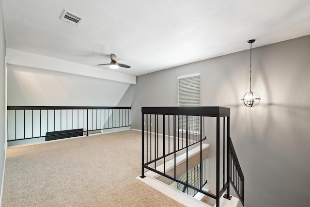 8330 Fathom Cir Unit 404, Austin, TX 78750 - hallway featuring an upstairs landing, carpet flooring, and baseboards