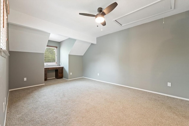 8330 Fathom Cir Unit 404, Austin, TX 78750 - additional living space with attic access, ceiling fan, carpet, baseboards, and vaulted ceiling