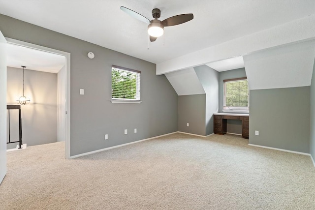 8330 Fathom Cir Unit 404, Austin, TX 78750 - additional living space with carpet flooring, ceiling fan, lofted ceiling, baseboards, and a desk