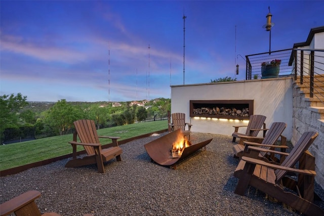 2551 Waymaker Way, Austin, TX 78746 - view of patio with an outdoor fire pit