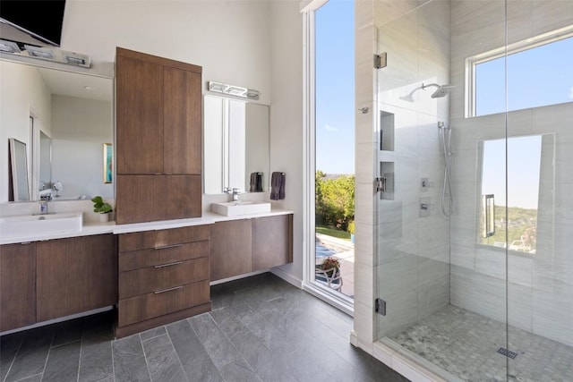2551 Waymaker Way, Austin, TX 78746 - bathroom featuring a stall shower and vanity