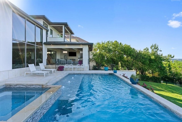 2551 Waymaker Way, Austin, TX 78746 - view of swimming pool with a patio, a pool with connected hot tub, and a lawn