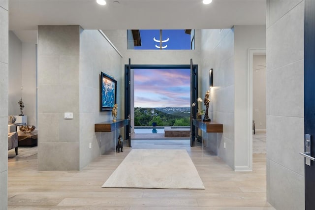 2551 Waymaker Way, Austin, TX 78746 - foyer entrance with wood finished floors and recessed lighting