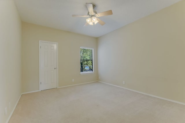 11970 Jollyville Rd Unit 214, Austin, TX 78759 - empty room featuring light colored carpet, baseboards, and ceiling fan