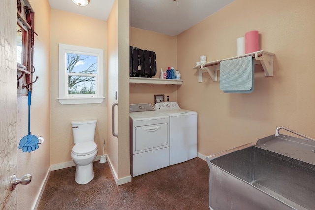 1110 County Road 487, Taylor, TX 76574 - washroom featuring separate washer and dryer and baseboards
