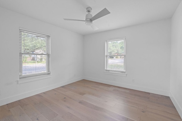 10300 Mourning Dove Dr, Austin, TX 78750 - unfurnished room featuring light wood-style flooring, baseboards, and a ceiling fan