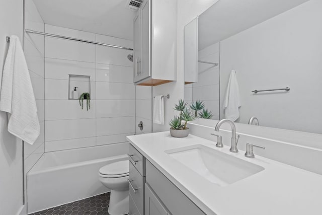 10300 Mourning Dove Dr, Austin, TX 78750 - bathroom featuring toilet, vanity, and washtub / shower combination