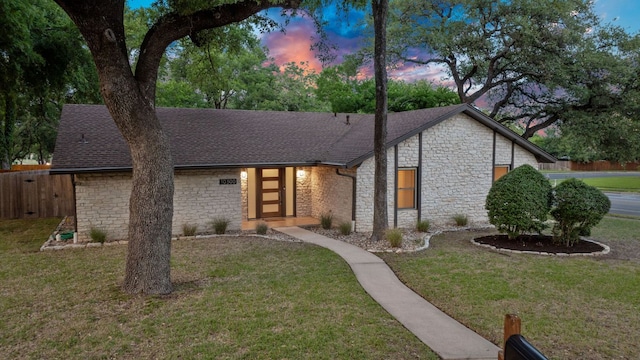 10300 Mourning Dove Dr, Austin, TX 78750 - mid-century modern home featuring stone siding and roof with shingles