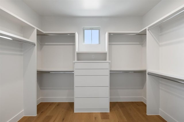 4600 Parkdale Pl, Austin, TX 78745 - spacious closet featuring wood finished floors