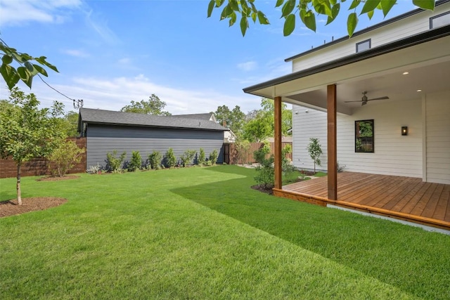 4600 Parkdale Pl, Austin, TX 78745 - view of yard with a wooden deck and a ceiling fan