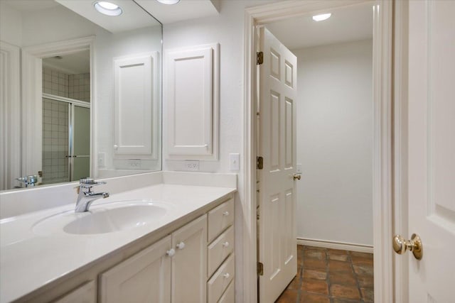 137 Firebird St, Lakeway, TX 78734 - bathroom featuring vanity and a tile shower