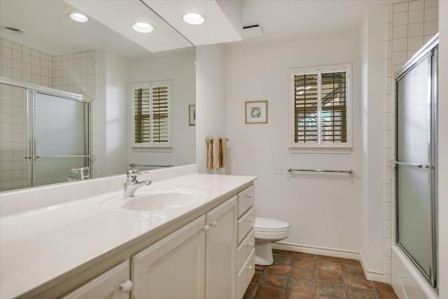 137 Firebird St, Lakeway, TX 78734 - bathroom with vanity, recessed lighting, and enclosed tub / shower combo