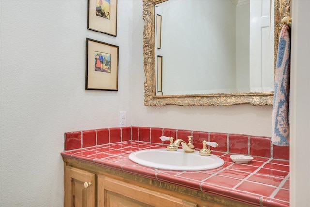 137 Firebird St, Lakeway, TX 78734 - bathroom featuring vanity and decorative backsplash