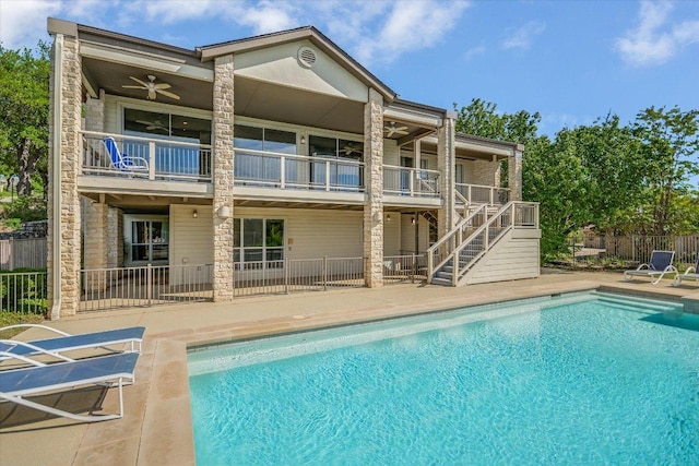 137 Firebird St, Lakeway, TX 78734 - back of house featuring stairway, a patio, a ceiling fan, and a balcony