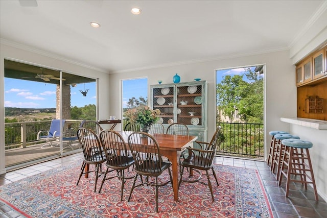 137 Firebird St, Lakeway, TX 78734 - dining area with healthy amount of natural light, crown molding, and recessed lighting