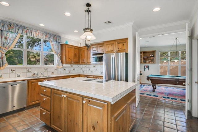 137 Firebird St, Lakeway, TX 78734 - kitchen with stainless steel appliances, tasteful backsplash, a kitchen island, recessed lighting, and billiards table