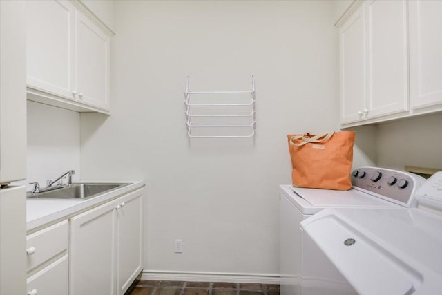 137 Firebird St, Lakeway, TX 78734 - laundry room with cabinet space, washing machine and clothes dryer, and baseboards