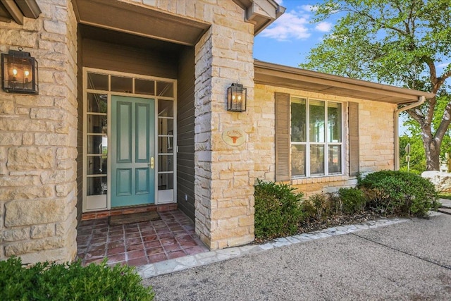137 Firebird St, Lakeway, TX 78734 - view of exterior entry featuring stone siding