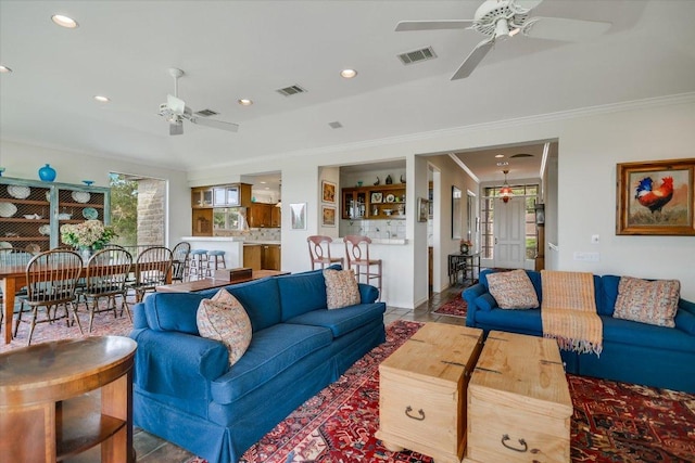 137 Firebird St, Lakeway, TX 78734 - living area with ceiling fan, crown molding, and recessed lighting