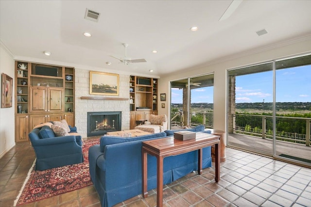 137 Firebird St, Lakeway, TX 78734 - living area featuring ceiling fan, ornamental molding, built in features, a fireplace, and recessed lighting