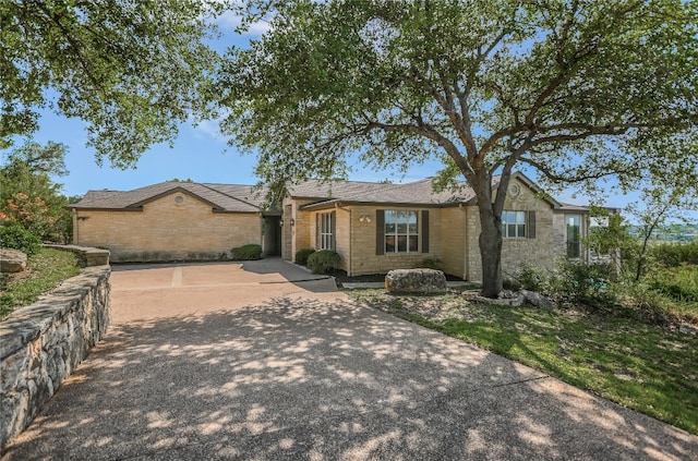 137 Firebird St, Lakeway, TX 78734 - ranch-style home with stone siding