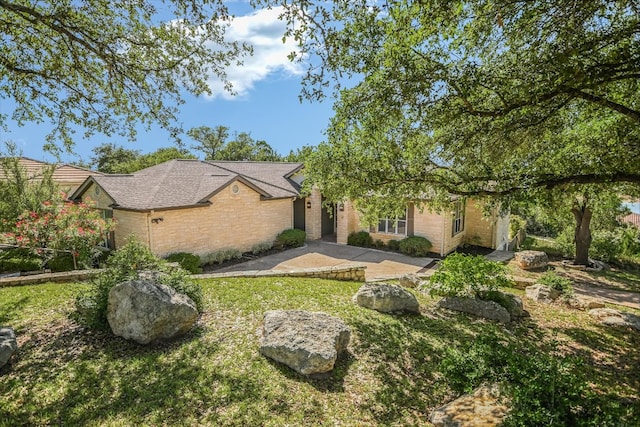 137 Firebird St, Lakeway, TX 78734 - view of front of property featuring a front yard