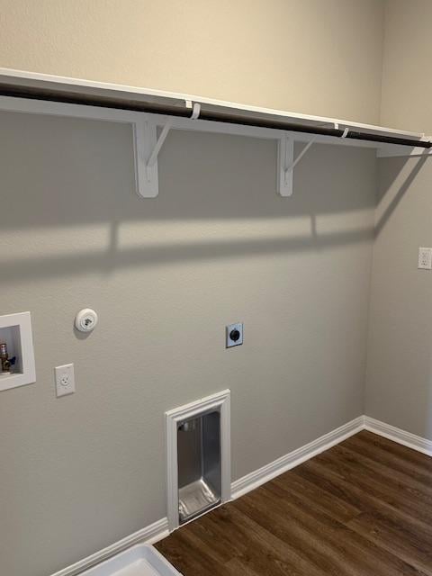 1015 Vista View Dr Unit 101, Georgetown, TX 78626 - laundry area featuring electric dryer hookup, gas dryer hookup, dark wood-type flooring, hookup for a washing machine, and baseboards