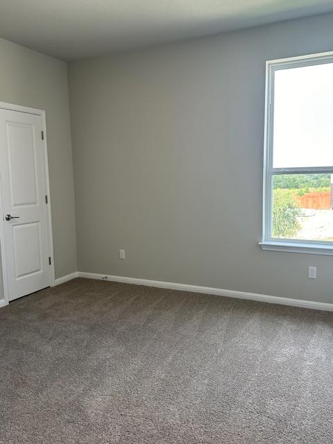 1015 Vista View Dr Unit 101, Georgetown, TX 78626 - carpeted spare room with baseboards