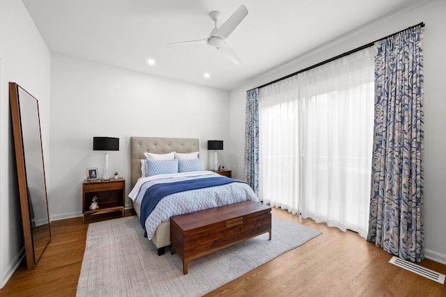 4107 Jefferson St, Austin, TX 78731 - bedroom featuring wood finished floors, recessed lighting, baseboards, and ceiling fan