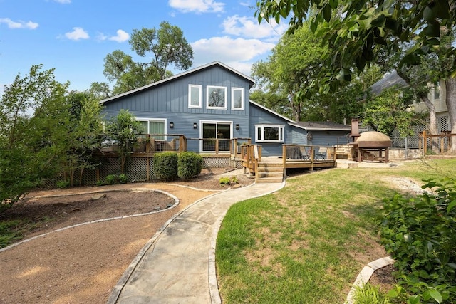 4107 Jefferson St, Austin, TX 78731 - back of house with a deck and board and batten siding