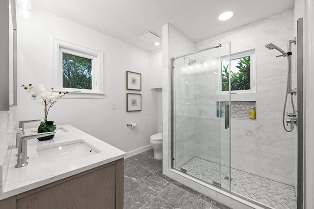 4107 Jefferson St, Austin, TX 78731 - bathroom with marble finish flooring, toilet, a stall shower, baseboards, and vanity