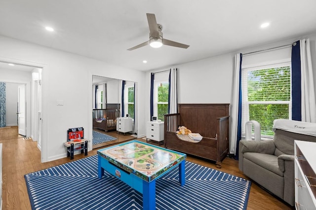 4107 Jefferson St, Austin, TX 78731 - living area featuring a ceiling fan, wood finished floors, and recessed lighting